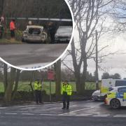 The police scene on Monday after a burnt out car and body was found on Long Lane, between Heaton and Shipley, in Bradford