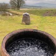 Ice barrels at the Broughton Sanctuary, where cold water therapy is among the wellness retreats