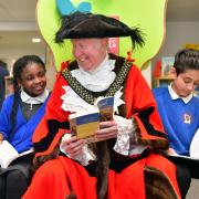 Lord Mayor of Bradford Gerry Barker helps to open the new library