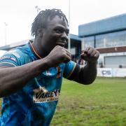 Eribe Doro celebrates with the Bradford fans at Featherstone after the club's first victory there in nine years. Photo credit: Tom Pearson