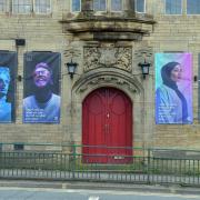 Unauthorised banners on the former Great Horton Library site