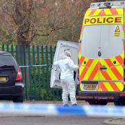 A forensic officer at the scene in Shetland Close, BD2, Bradford on April 18