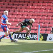 Junior Sa'u goes over to score one of his three tries in Cougars' high-scoring win over Rochdale earlier this season.