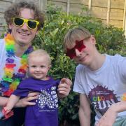 Rhys Connah and his brothers Teddy (centre) and Ryan preparing for the Colour Run
