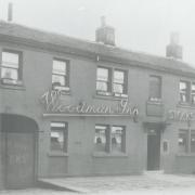 The Woodman pub in Bankfoot, pictured in the 1920s