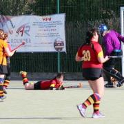 A prostrate Jules Carroll equalises for Bingley Bees women against Leeds Thirds