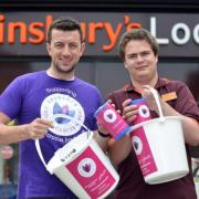 Christian Mellow from Sainsbury's with Dav Calogero from the Crocus Appeal outside the Great Horton Store