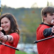 TAKING AIM:  Freya Leask and Dean Dowling, of the University of Bradford's Archery Club, are taking part in a non-stop 24-hour shoot-out for the Telegraph & Argus Crocus Cancer Appeal