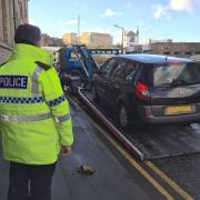 A car seized during a police crackdown on danger drivers in Bradford.