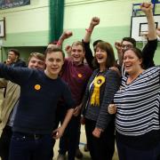 Elizabeth Leffman, Liberal Democrat candidate, celebrates with supporters at the Witney by-election count