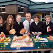 Pupils at Christ Church Academy Windhill, who are involved in the 'Fuel for School' initiative. Pictured are: Deputy head Richard Ireland with Jennifer Daly, Eloise Skirrow, Katie Sharp, Grace Harding, Ryan Cullimore and Alfie Stannet