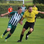 Golcar United (yellow shirts) are unbeaten this season in the Premier Division Picture: John Chapman