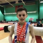 Jack Stanley shows off his impressive haul of medals