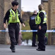 Police at the scene of the crash in which Amriz Iqbal was fatally injured