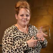 Michelle Taylor, who accepted the Governor of the Year award on behalf of Alix Mann