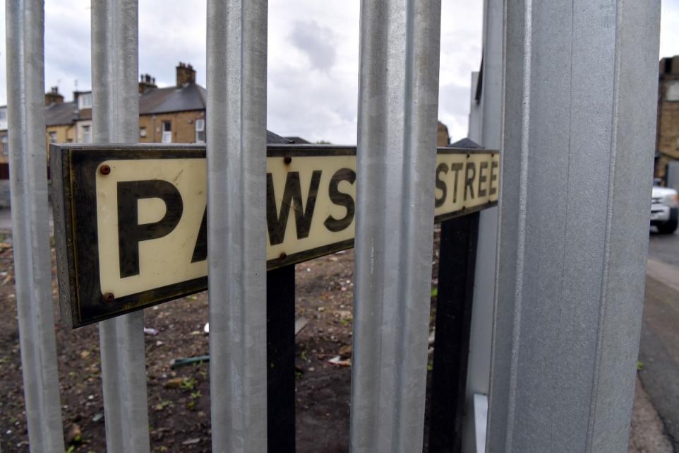 Bradford Telegraph and Argus: The fence has been installed around the site off Pawson Street