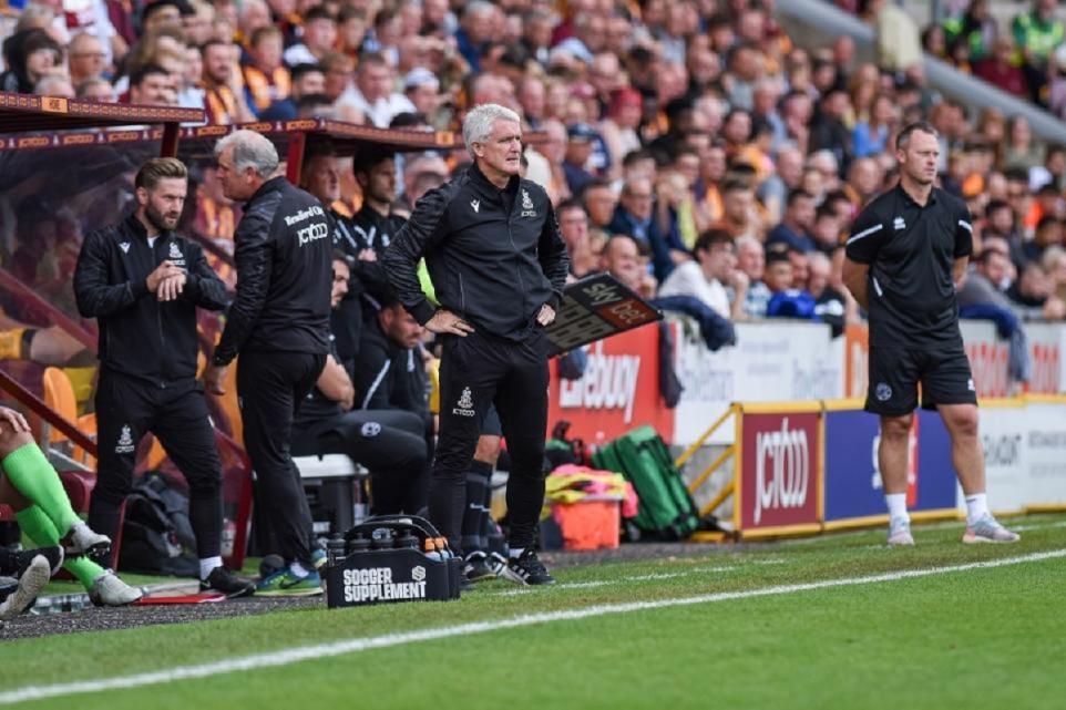 Bradford Telegraph and Argus: Michael Flynn, right, on the Valley Parade touchline with Mark Hughes