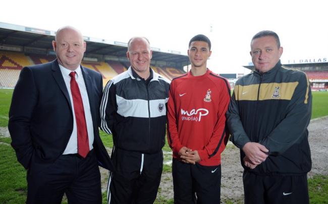 Nahki Wells, second right, with, from left, City director of operations David Baldwin, RIASA head coach Mark Ellis and City youth coach Peter Horne