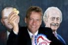 Ken Brook-Chrispin, chairman of Seabrook crisps, with the packets of sea salt flavour crisps carrying the Blah! message that it aims to be the UK's biggest political party