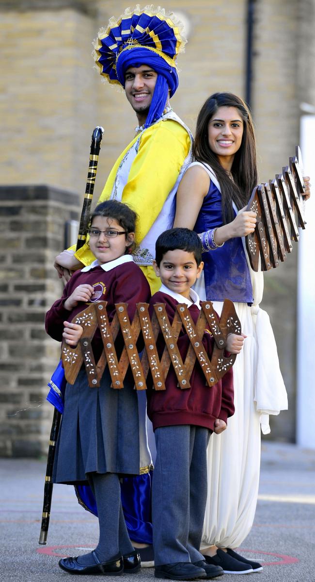 Punjabi Roots Academy’s Alesha Gill and Navraj Gill with pupils Alesha Zeb and Ehsan Faizan