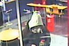 The CCTV image of the raider at the bookies on Manchester Road