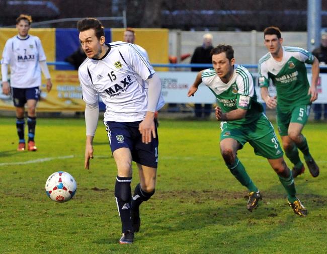 HE’S BEHIND YOU! Craig Hobson in action for Guiseley during Saturday’s 3-0 FA Trophy second-round triumph over derby rivals Bradford Park Avenue