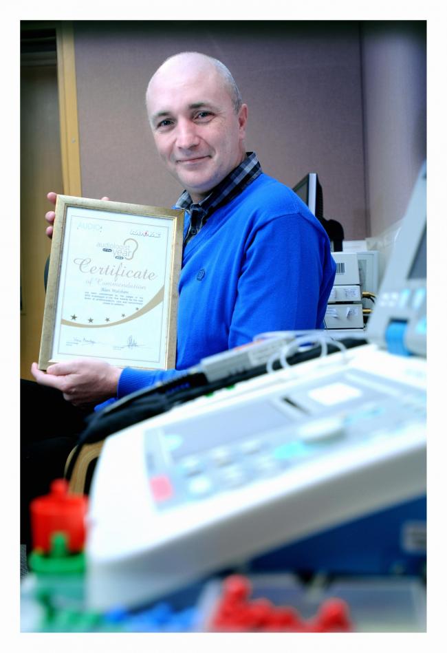 Alan Walshaw with his certificate of commendation