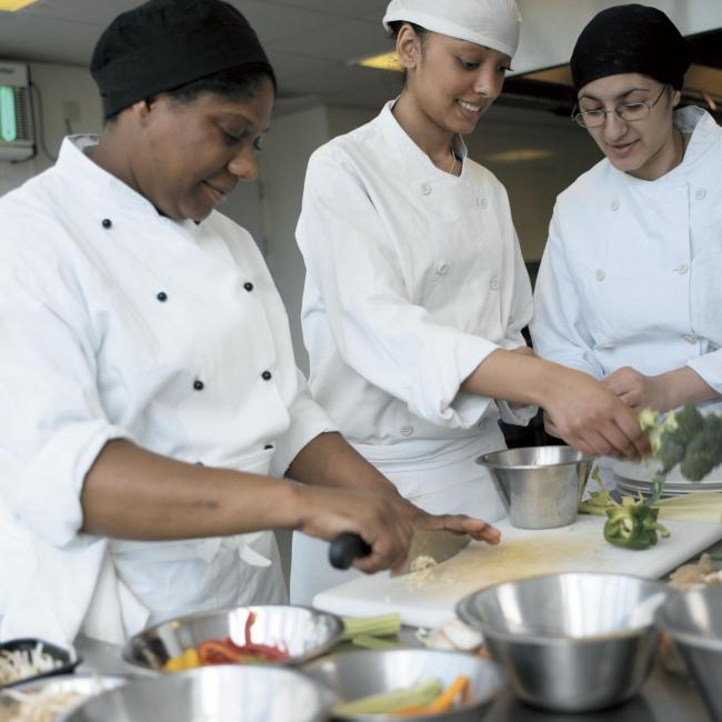Catering trainees learning the skills of the kitchen