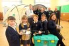 Headteacher Richard Hunt, back left, with pupils and members of Skipton Rotary