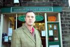 Councillor Glen Miller outside Haworth Post Office, which is due to close