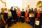 Members of a Keighley Muslim community visit care home