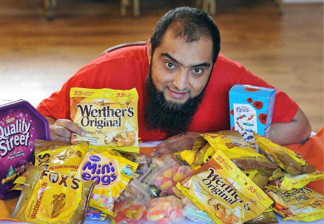 Intouch Foundation founder, Osman Gondal, with sweets donated to the charity appeal