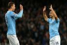 Sergio Aguero, right, was on target against Blackburn in Man City's 5-0 FA Cup romp