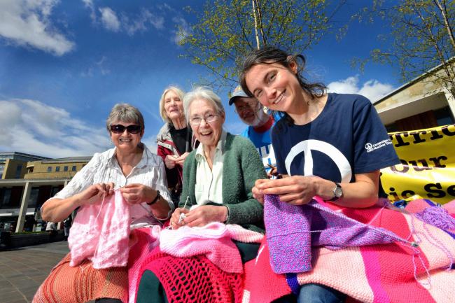 Anna young, Sylvia Boyes, Alison Tyas, Dave Webb and Catherine Bann click their knitting needles in protest