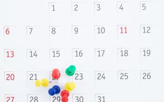 A calendar with pins on the 22nd of the month. Credit: Canva
