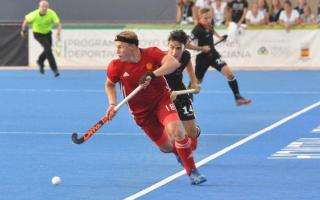 Matthew Ramshaw (red) in action for his country. Picture: England Hockey.