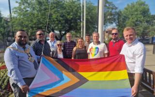 Councillor Mohammed Nazam, left, at the Pride flag-raising ceremony