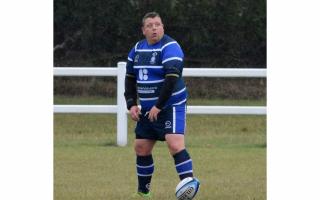 New Wibsey boss Darren Greenwood kicking for goal at Old Otliensians last season in his player-coach role. Photo credit: Picasa