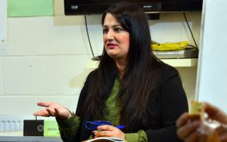 Saliha Sadiq, leads a tea-fuelled therapy group