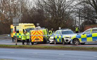 Emergency services at the scene of the crash on Stanningley Road, Leeds