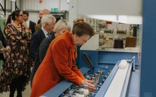 Princess Anne gets hands on during her visit to Laxtons Specialist Yarns in Baildon yesterday.
