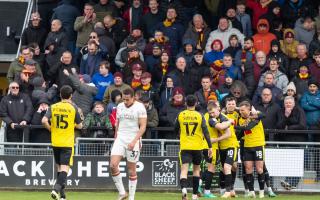 A stunned City section look on as Harrogate enjoy their third goal