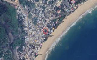 The small village of Busua, in Ghana, with Dadson's Lodge marked in the red circle