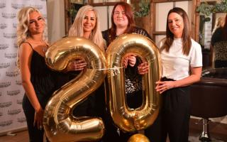 Staff at Seymours Cutting Room celebrate being in business for 20 years