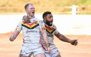 Kieran Gill and Keven Appo celebrate the former's late try against Swinton in the 1895 Cup quarter-final, which sealed Bulls' spot in the last four.