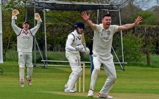 Sheriff Hutton Bridge bowler Freddie Collins and wicket-keeper Ben Gill appeal for lbw but Woodhouse Grange batsman Simon Tennant survived Picture: Nigel Holland