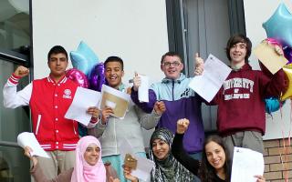 University Academy Keighley students celebrate their GCSE results. From left, back, Bilal Hayat, Shamraiz Ashfaq, Jack Sharples and Joe Grasham, and front, Marria Ali, Mariam Kousar and Sonia Khan