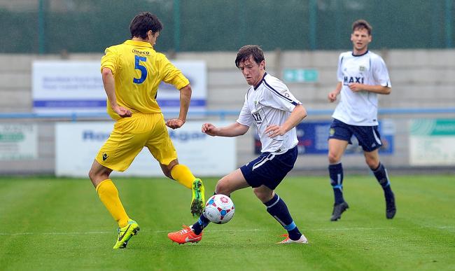Josh Wilson, pictured here in action for Guiseley, was on target for Chorley against his former club