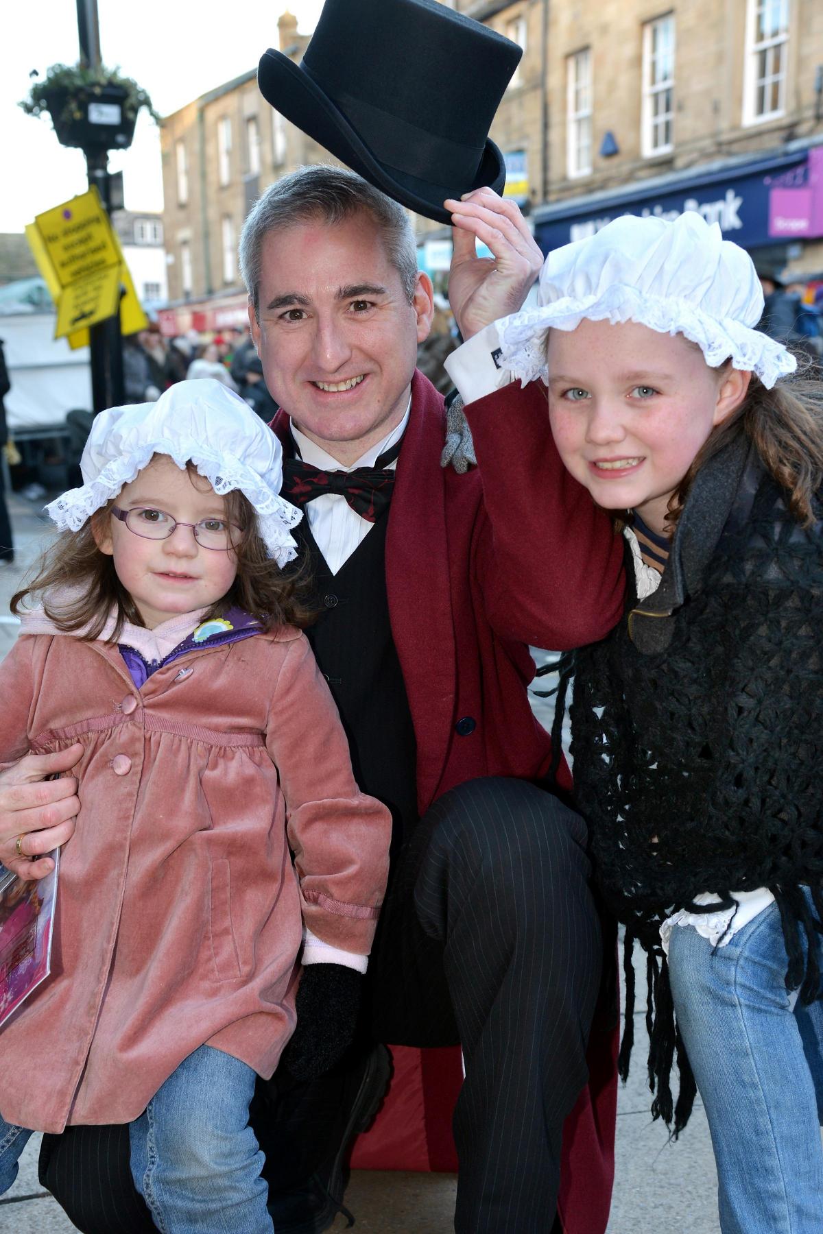 MP Greg Mulholland with his daughters, Ava, four, and Isabel, nine, at Otley Victorian Christmas fair