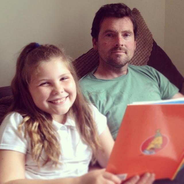 Dominic Tallant reading to his daughter, Ruby aged 9. Ruby is an avid reader and a couple of her favourite authors are Jacqueline Wilson and David Walliams.